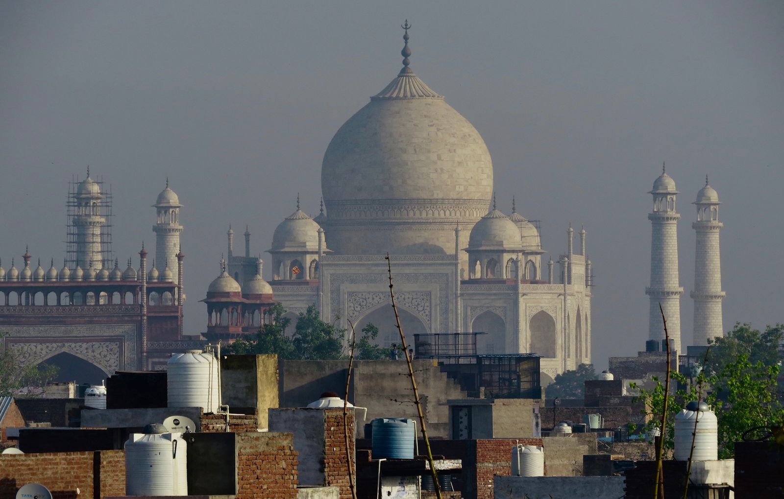 The Taj Mahal rising above the rooftops of Agra