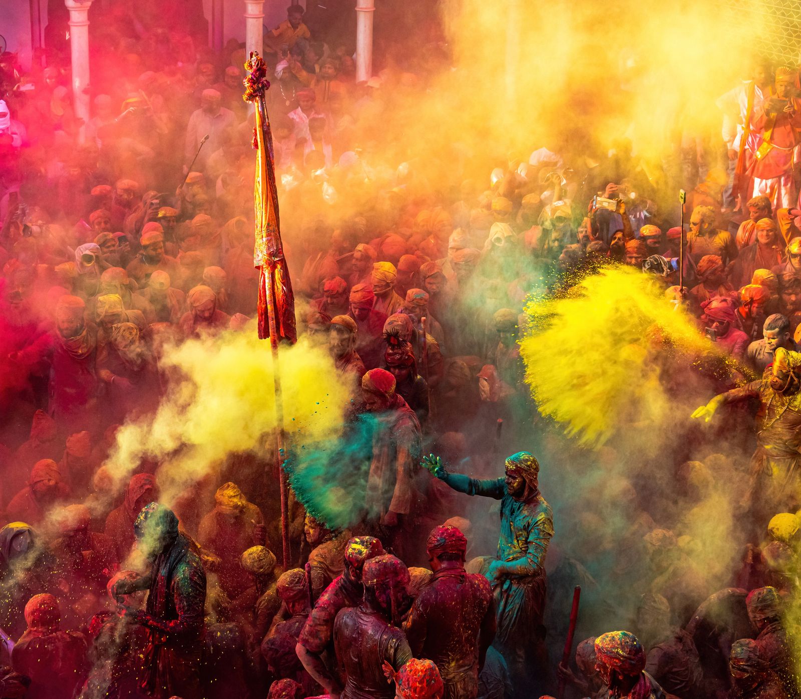 Revellers drenched in colour during Lathmar Holi in Nandgaon, near Barsana