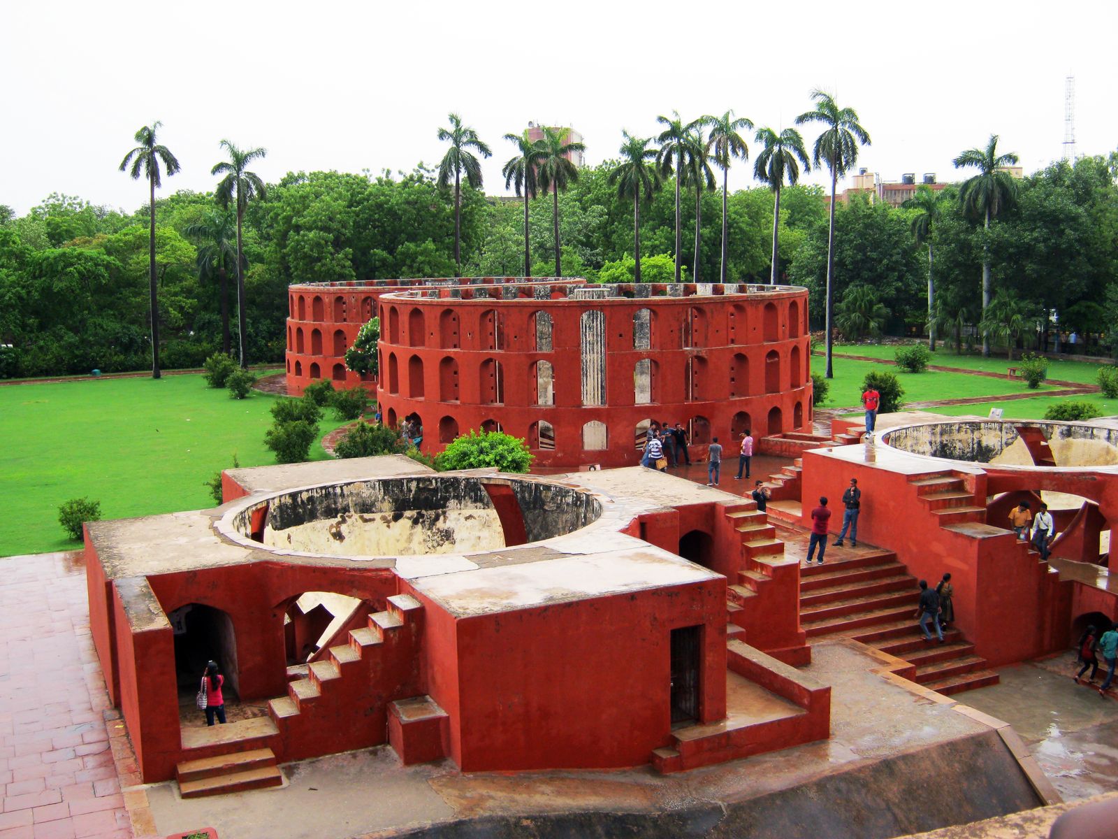 The giant pink and terracotta masonry instruments of the Jantar Mantar observatory in New Delhi