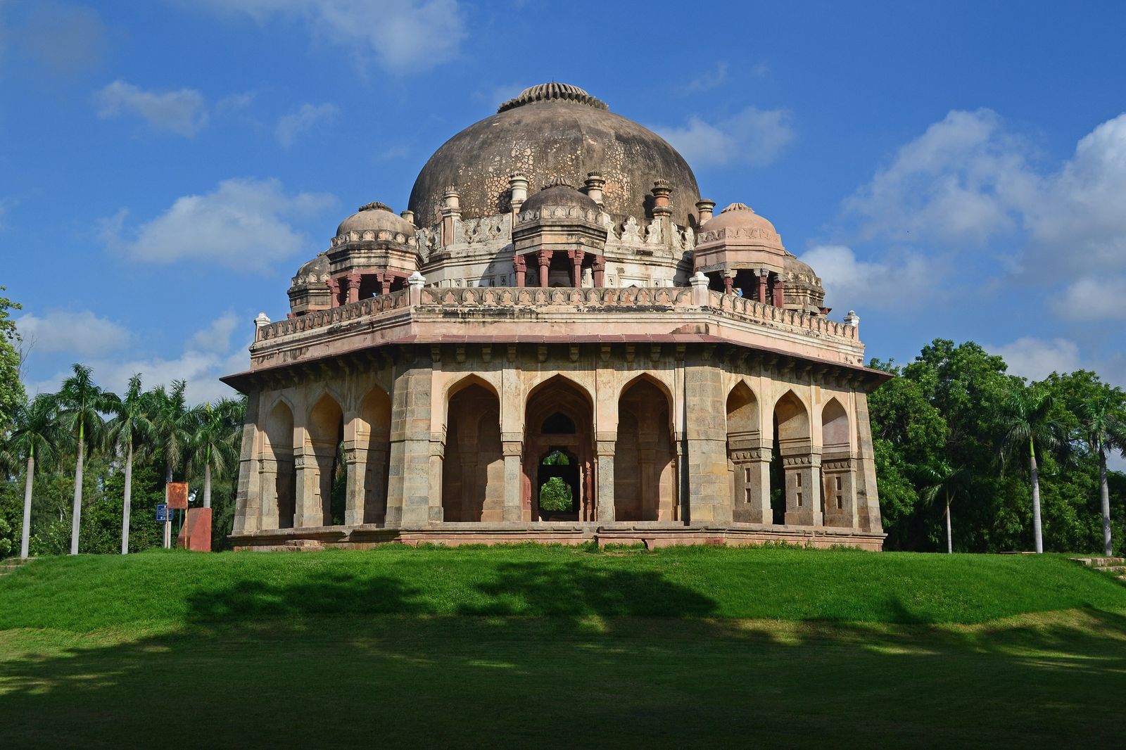 Old trees and the domed fifteenth-century tomb of Muhammad Shah in Lodhi Garden, New Delhi
