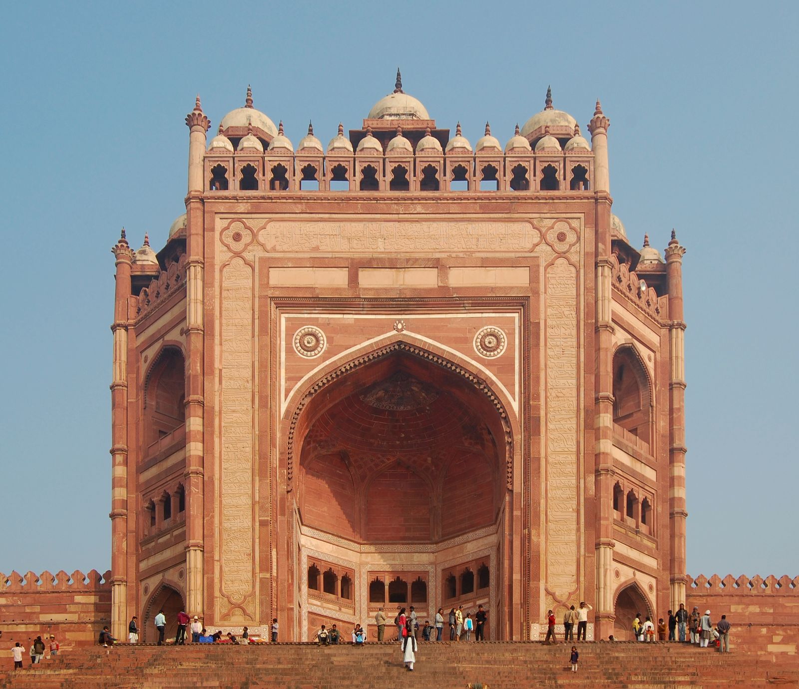 The towering red sandstone Buland Darwaza gateway at Fatehpur Sikri seen from the steps below