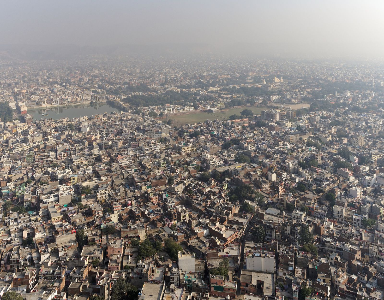 The walled city of Jaipur spread across the plain below the ramparts of Nahargarh Fort
