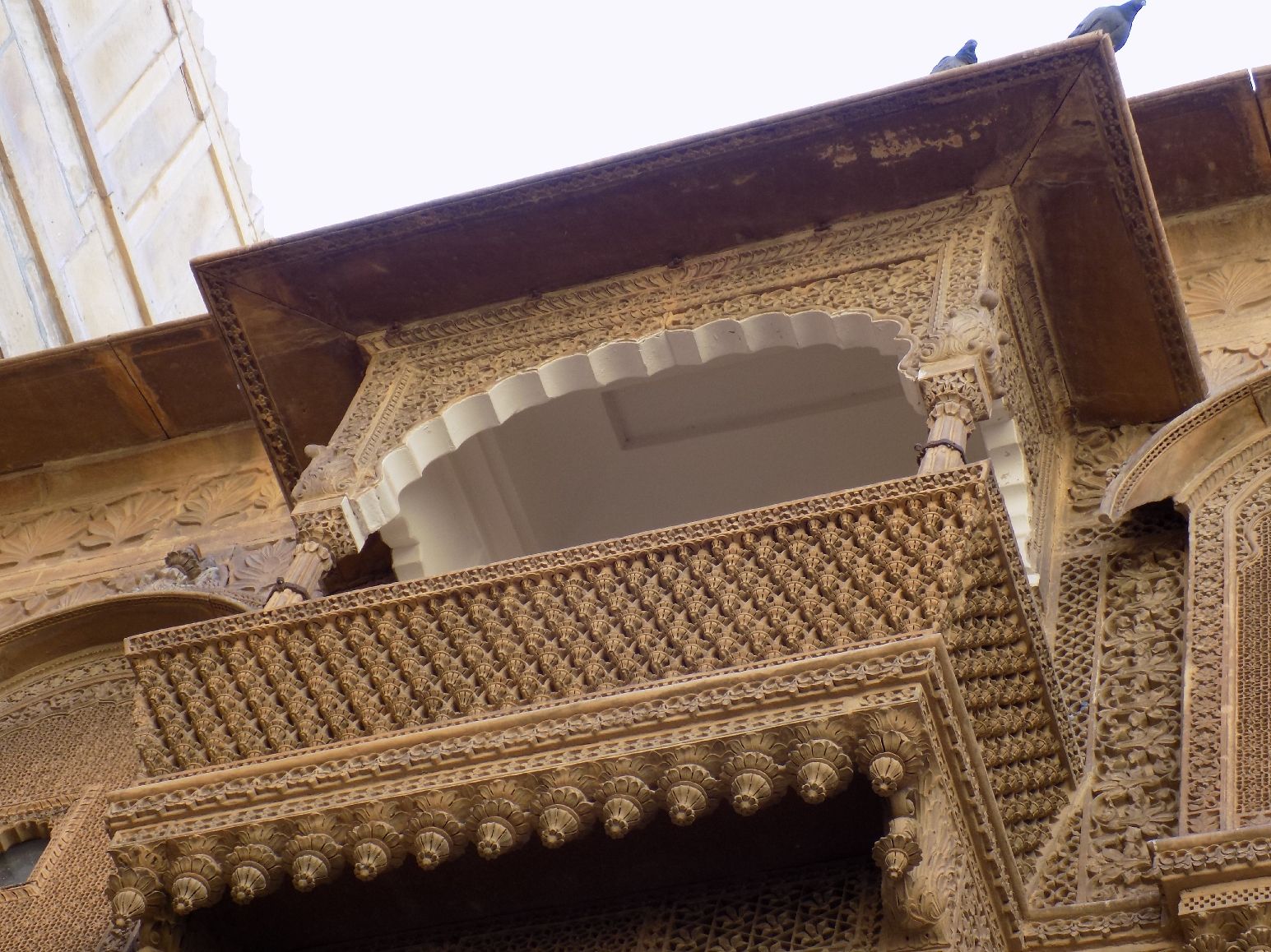 The carved overhanging balconies of the top storey of Salim Singh ki Haveli in Jaisalmer