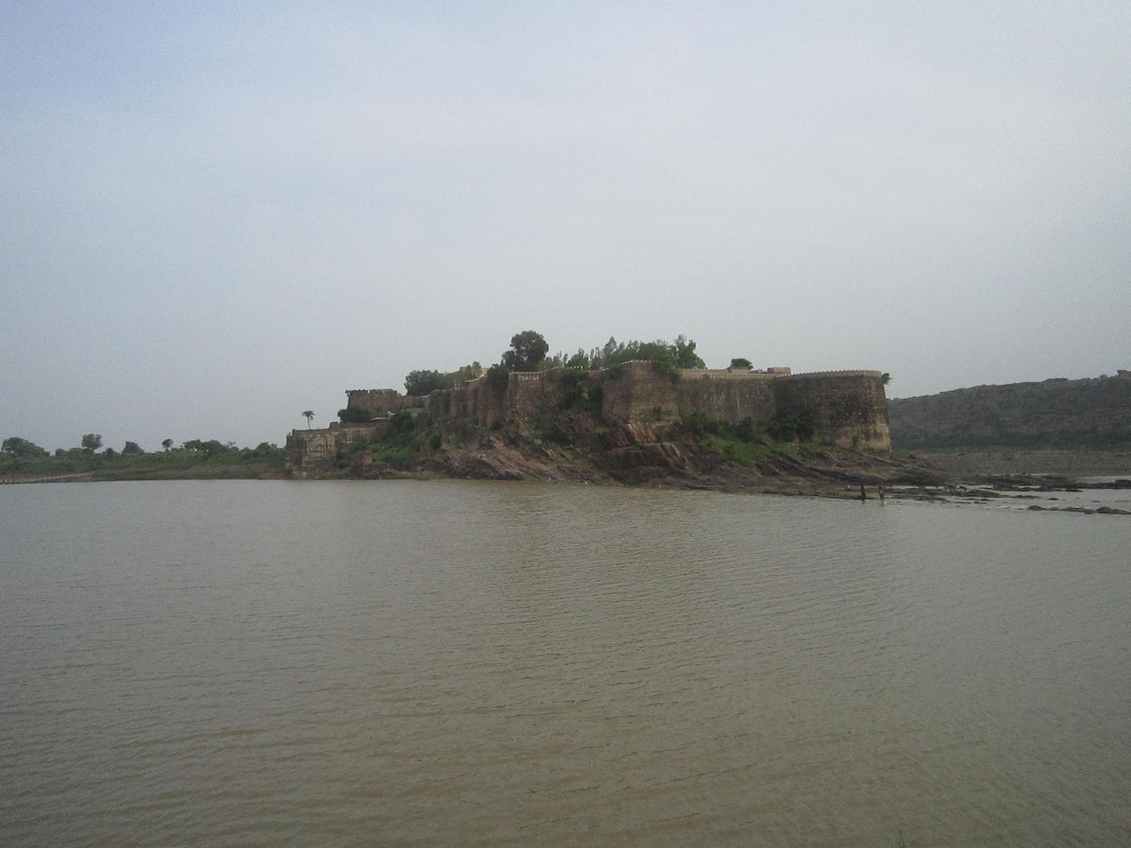 The double walls and bastions of Gagron Fort beside the river near Jhalawar