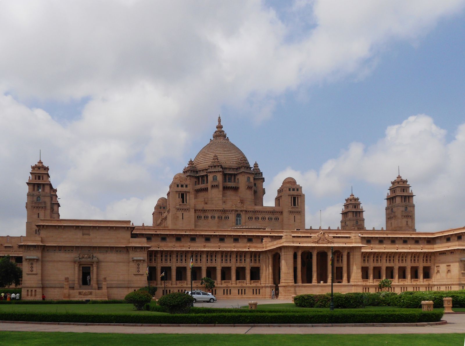 The domed sandstone facade of Umaid Bhawan Palace on Chittar Hill in Jodhpur