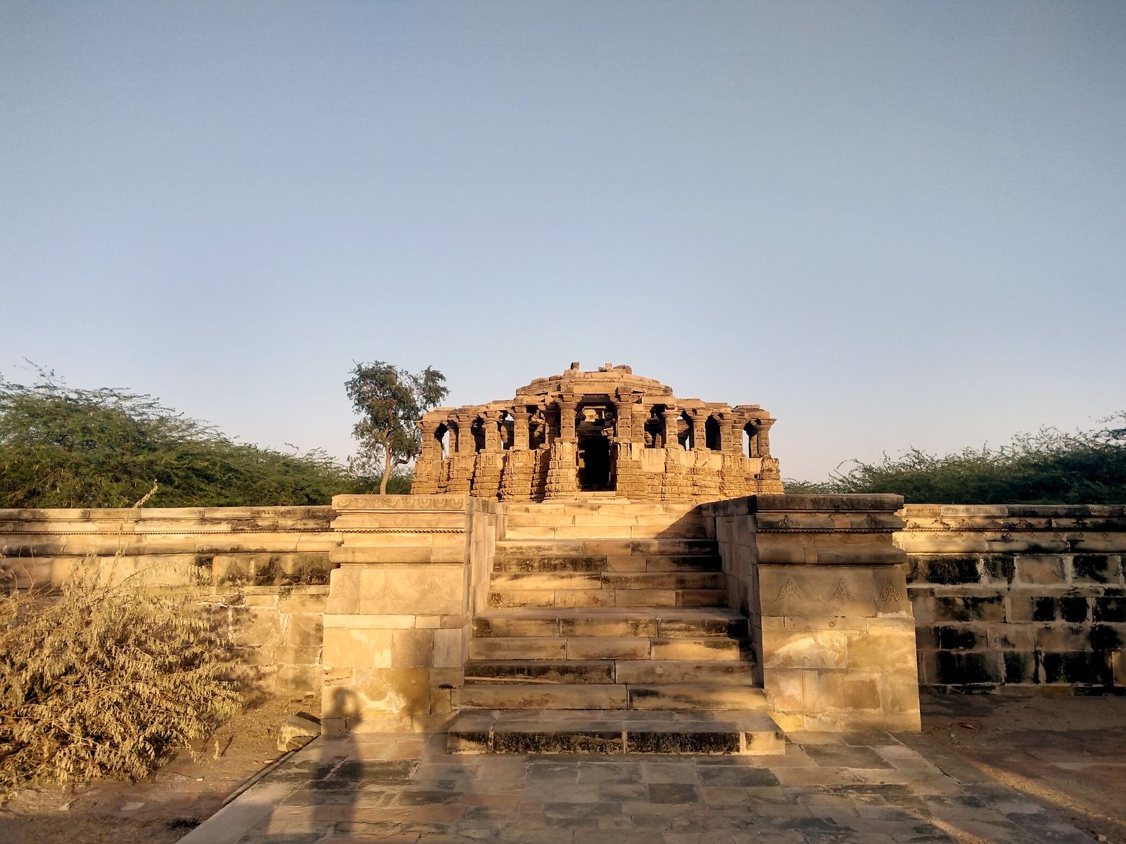 Detailed carvings of dancers, musicians and animals on the walls of the Kiradu temples near Barmer