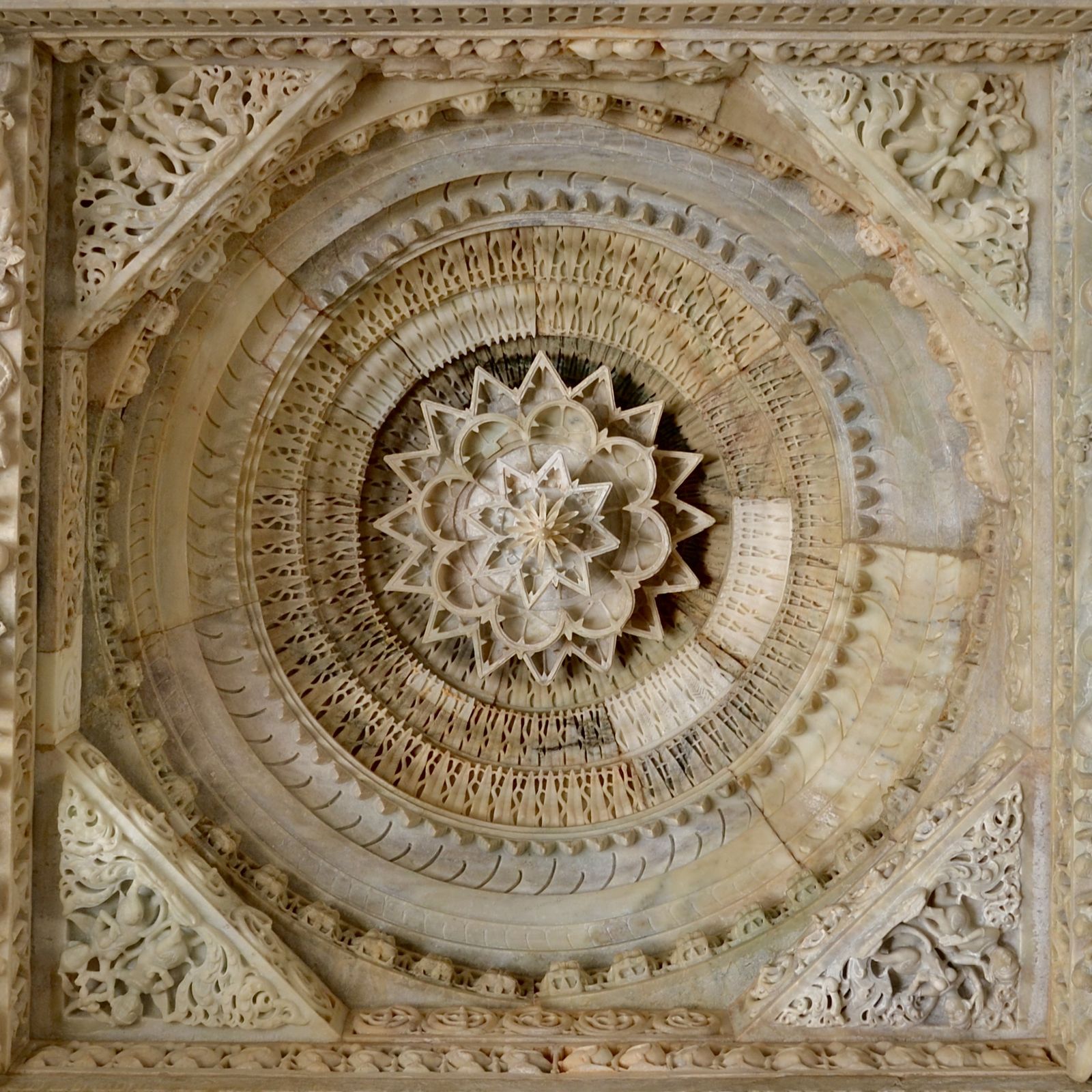 A carved white marble ceiling inside one of the Dilwara temples on Mount Abu