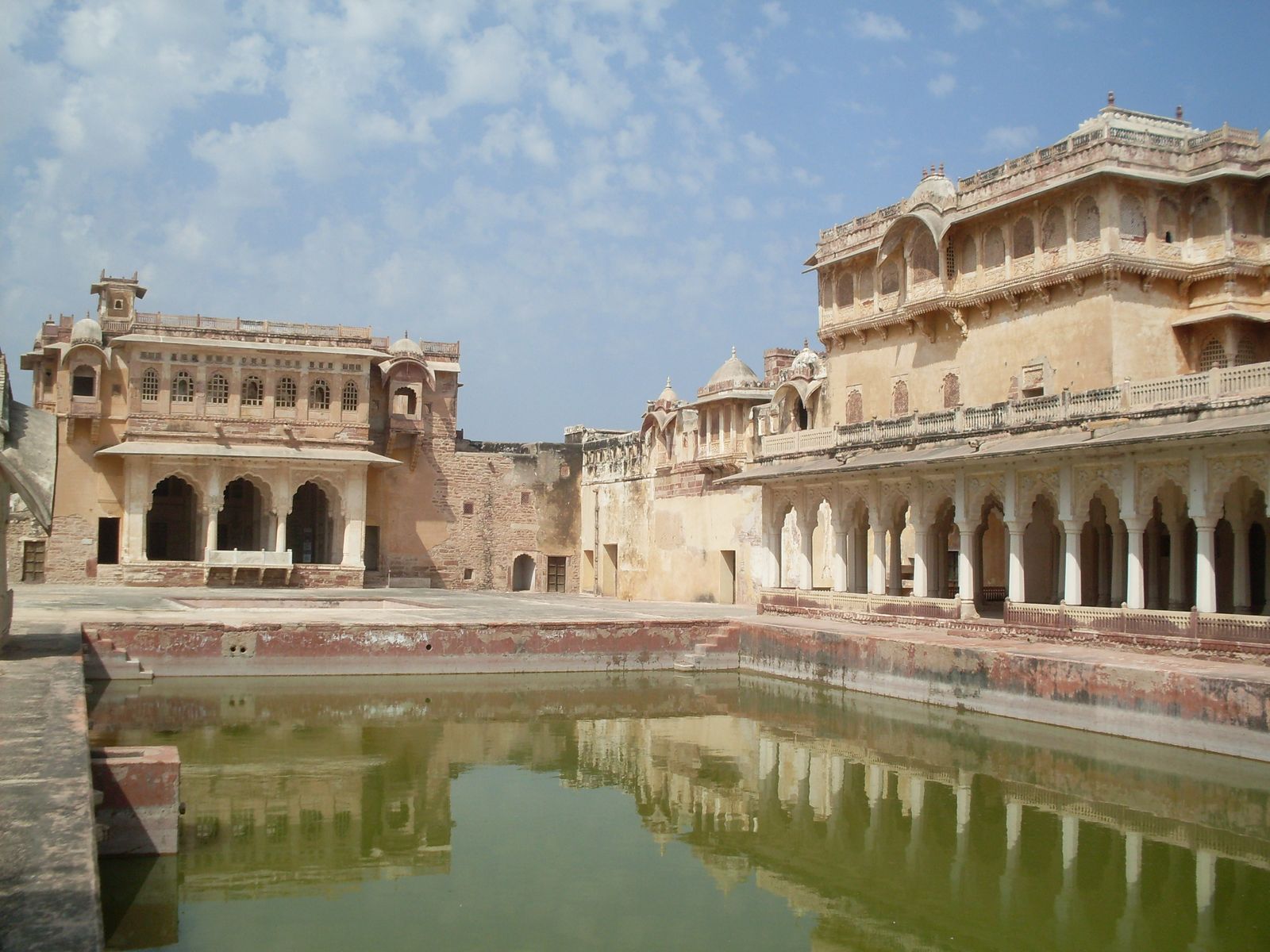 The stone walls and gateway of Ahhichatragarh, the fort of Nagaur, under a clear desert sky