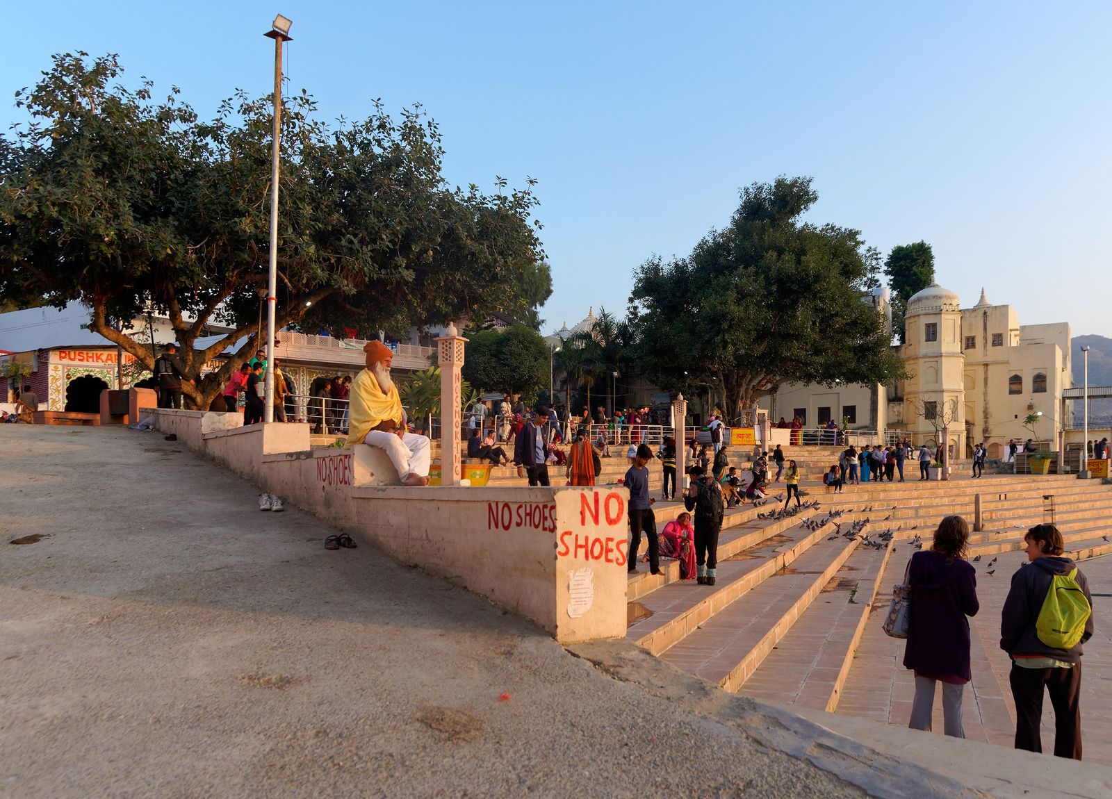 Pilgrims and temples along the bathing ghats of the sacred lake at Pushkar