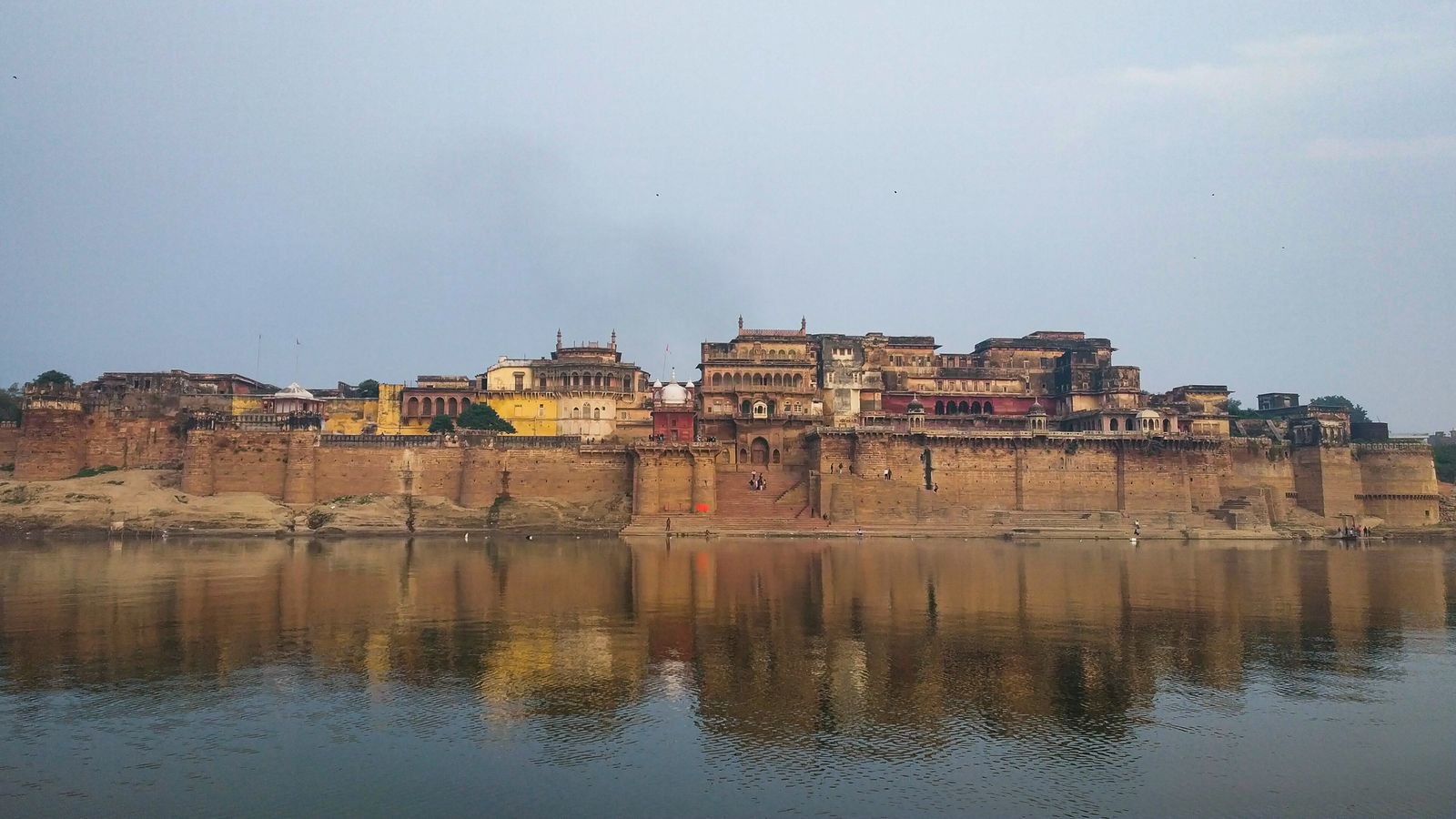 The sandstone walls of Ramnagar Fort rising above the eastern bank of the Ganga near Varanasi